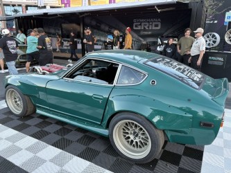 Teal Datsun Z — twin-turbo V8, SEMA outdoor grid display