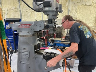 Wayne at the mill — machine work in the shop