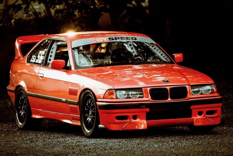 Rear three-quarter — louvered fenders, competition spoiler, #56 XSA