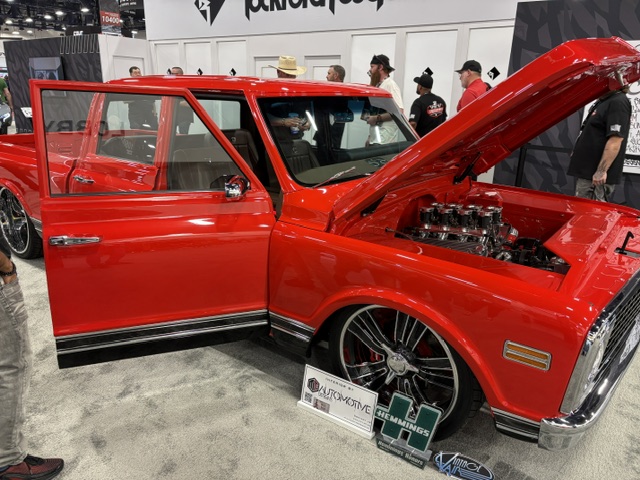 Red C10 — blown engine, open doors, Hemmings award, SEMA