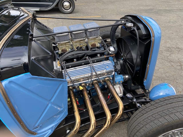 Blue 5-window coupe — louvered rear deck, side pipes, flame detail