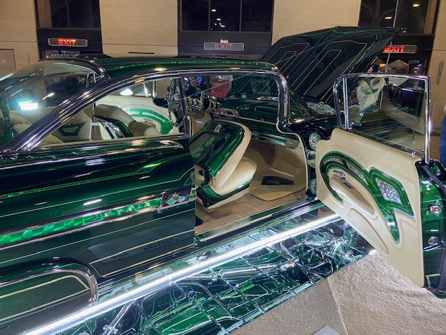 Green lowrider — mirror floor, custom interior, open doors