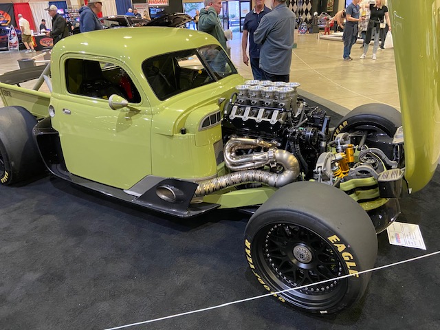 Chartreuse truck — twin-turbo V8, drag slicks, GNRS