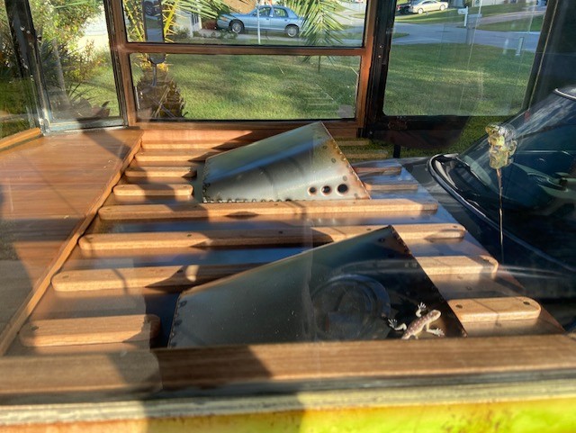 Interior floor — custom hardwood slat flooring with bead-rolled metal panels