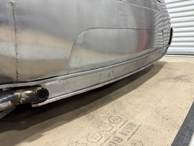 Rear quarter extension — panel work complete, ready for metal finishing