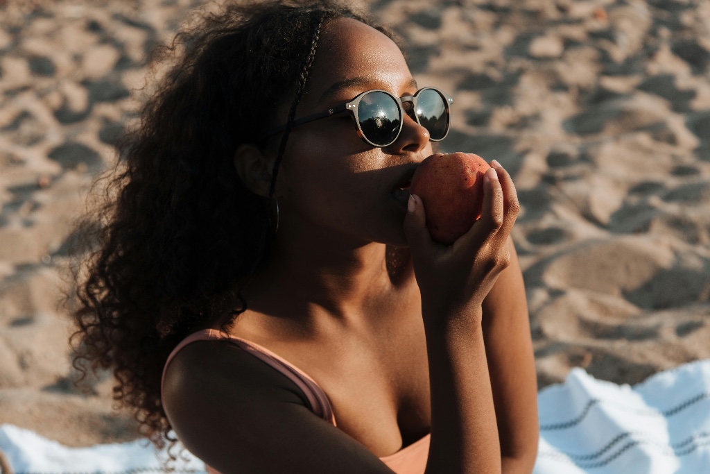 Wearing IAO sunglasses on the beach