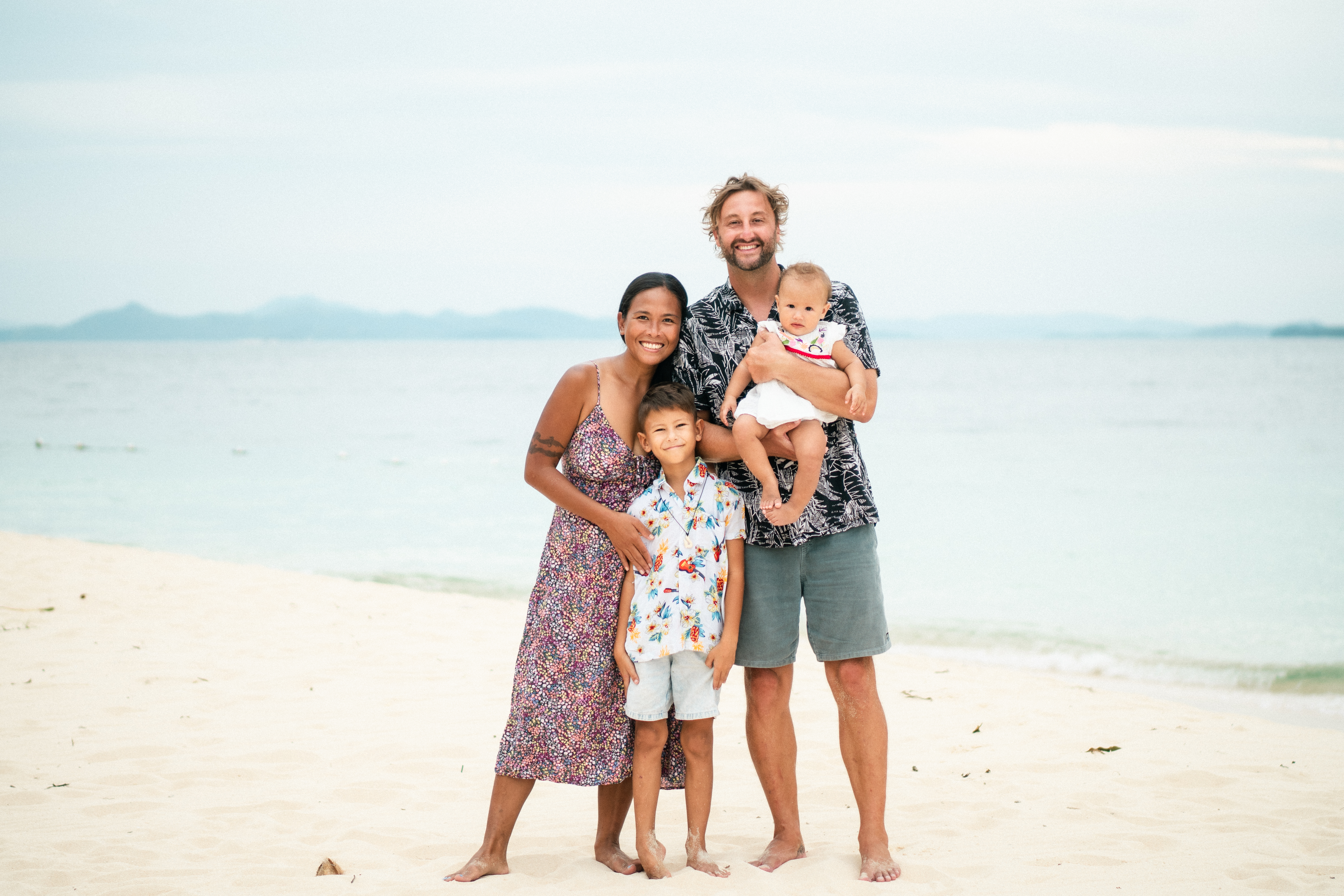IAO family on the beach in Siargao
