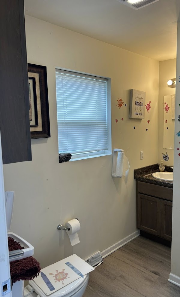 Fixture installation — bathroom vanity and light