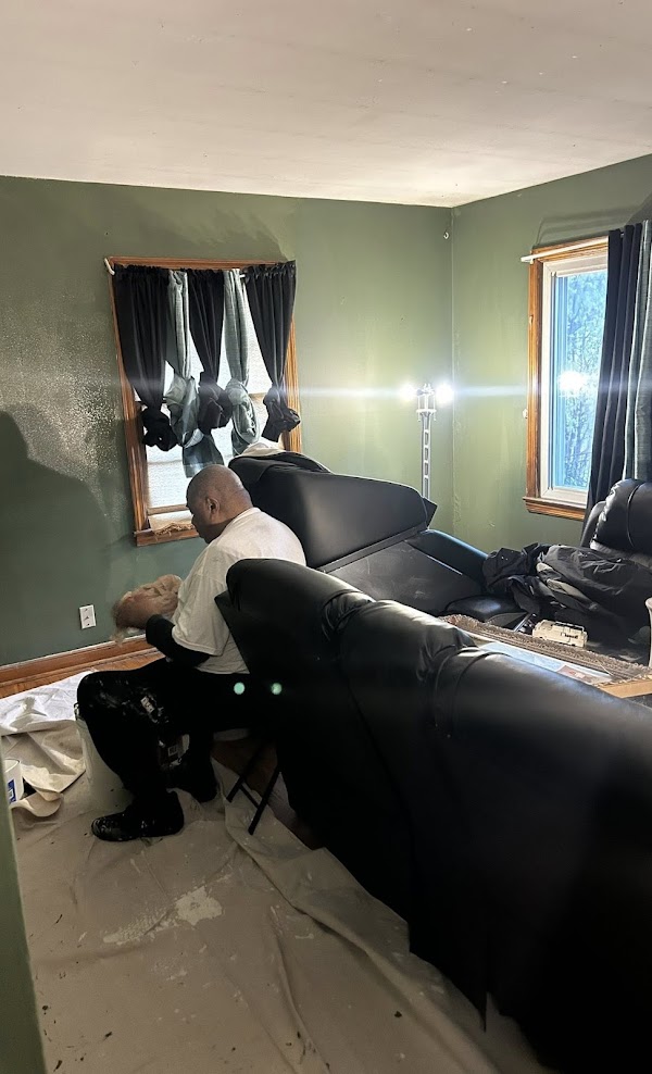 Interior painting — walls being finished