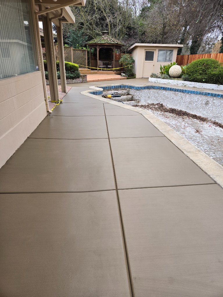 Completed large concrete patio with steps