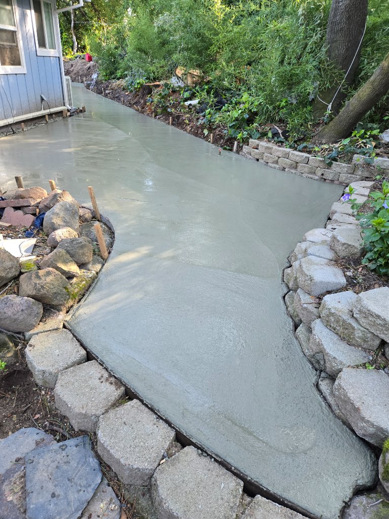 Concrete pool surround walkway completed