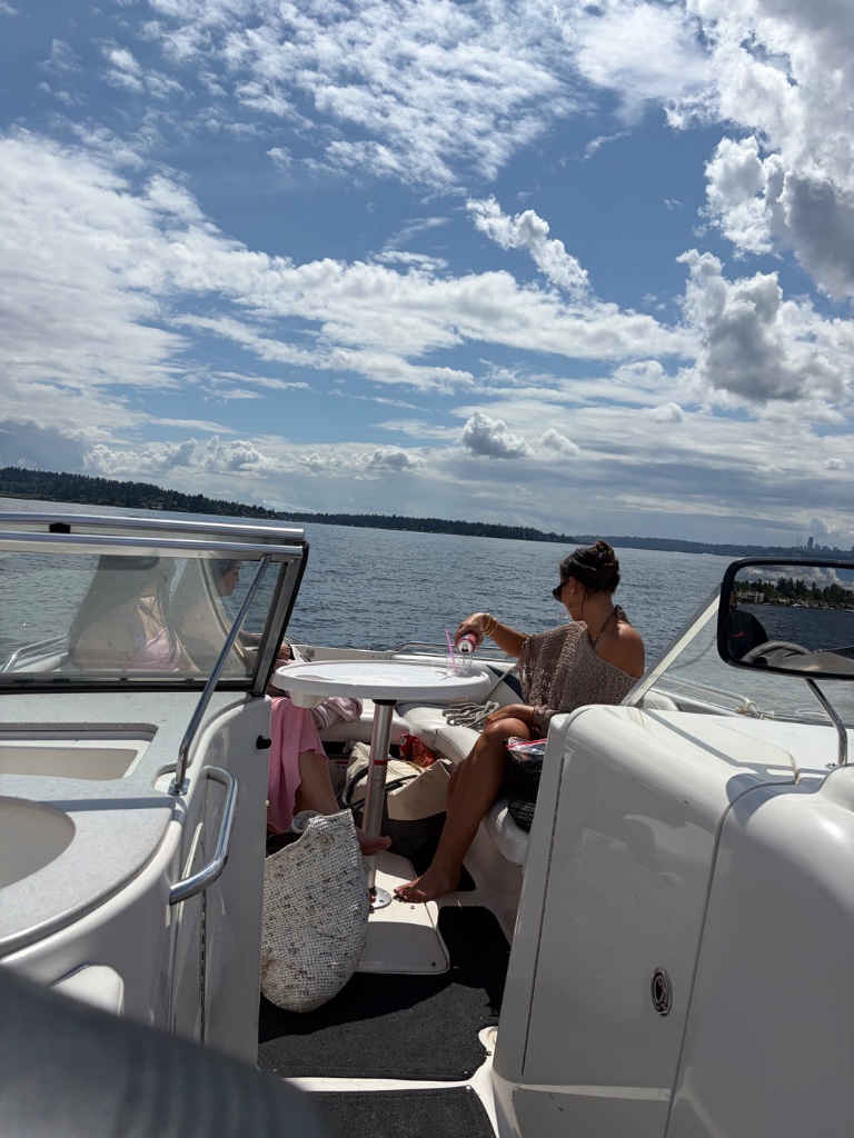 Pouring a drink at the boat table on Lake Washington
