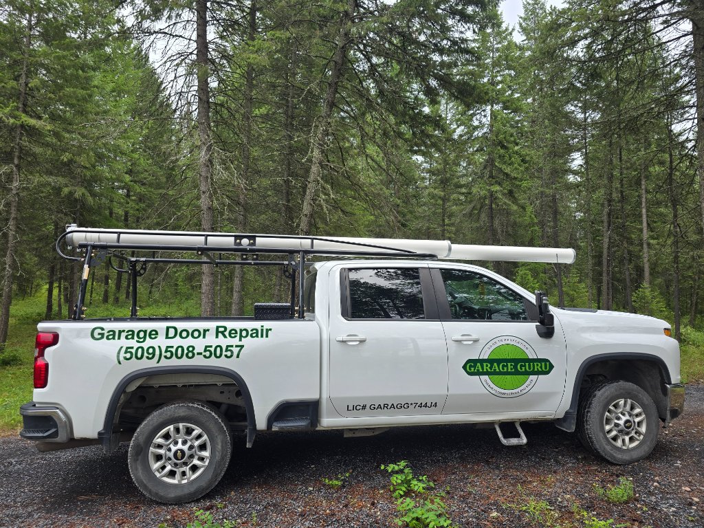 Garage Guru branded service truck with fully loaded mobile workshop, serving Spokane garage door repair
