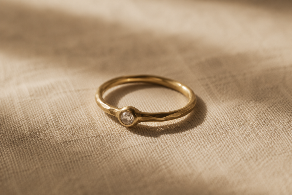 Handcrafted gold ring with diamond