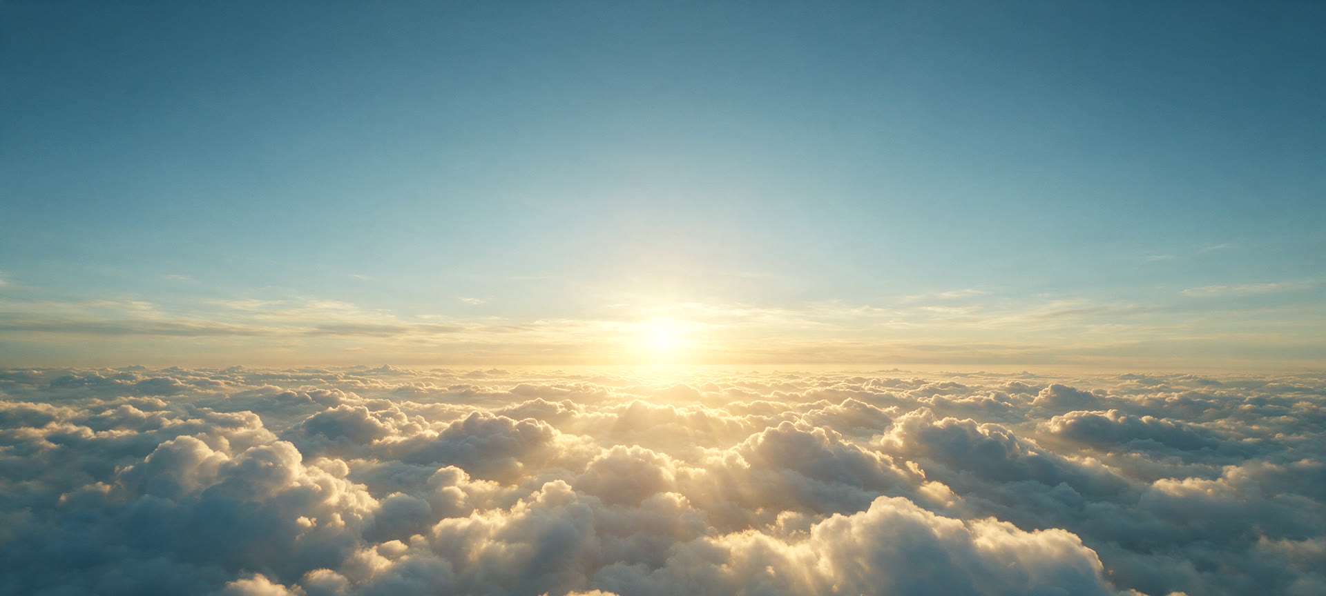 Open sky above a low cloud bank.