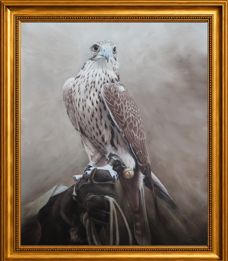 A tall, vertical composition — a white falcon with warm russet markings stands on a leather perch against deep darkness, radiating quiet majesty.
