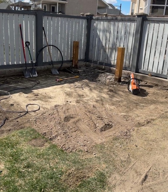 Backyard excavation and preparation for patio installation