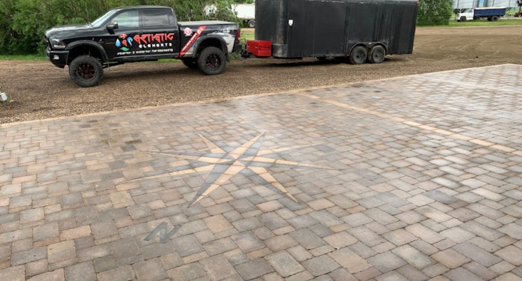 Artistic Elements truck and custom star paving stone driveway