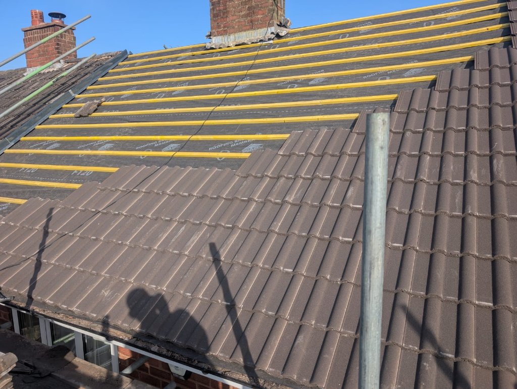 New roof installation Worcester — membrane and battens with tiling in progress