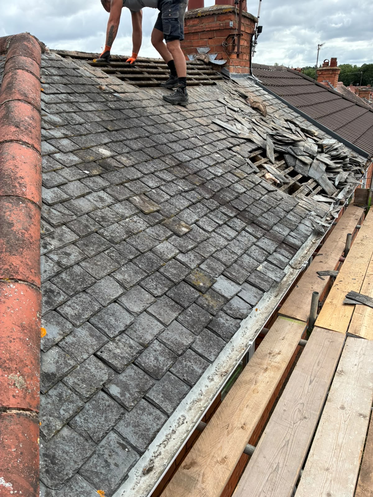 New roof installation Worcester — roof stripped to bare battens