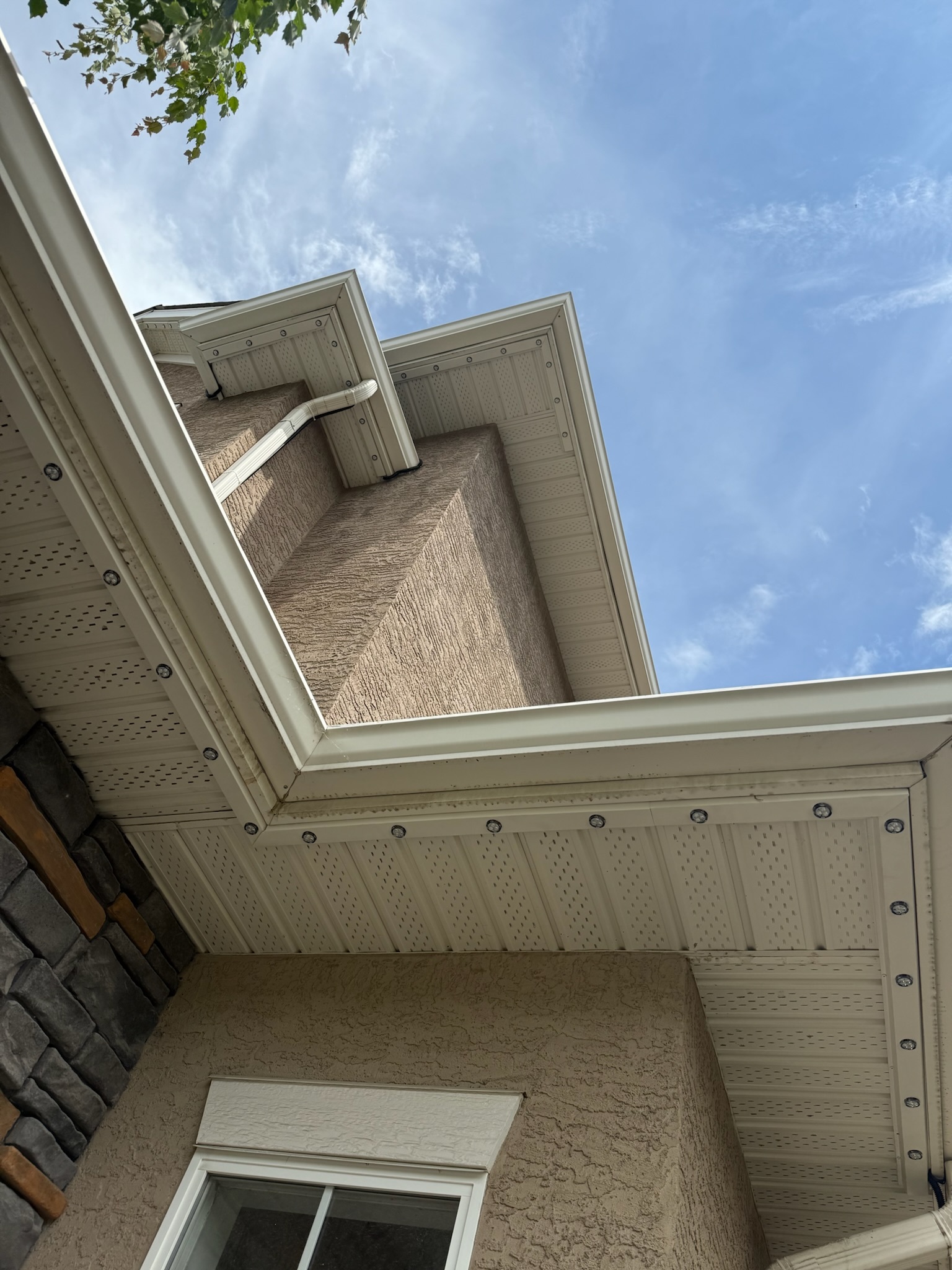 AllStar Lighting fixtures sitting flush in a white soffit and fascia