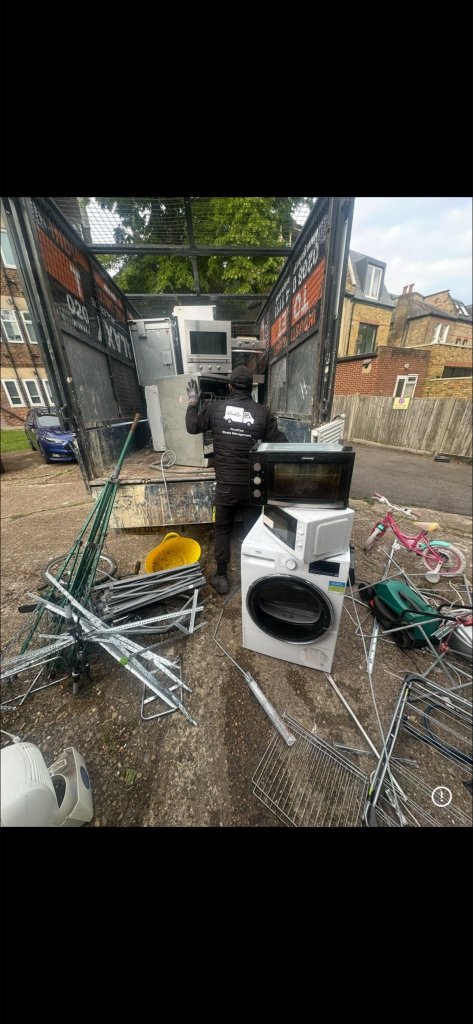 RicaRise team collecting scrap metal and appliances