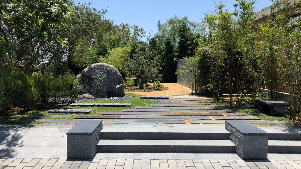 Boulder garden with granite stepping stones, decomposed granite path, bamboo grove