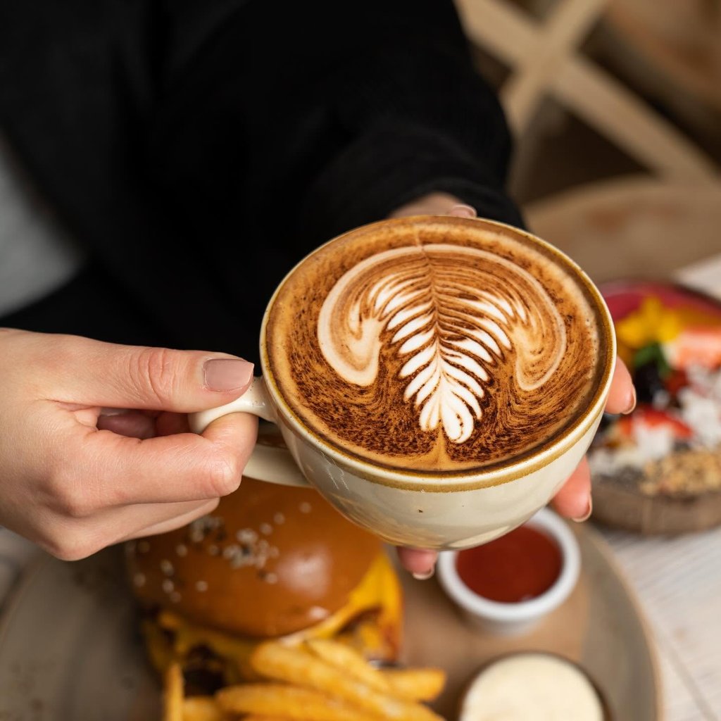 Handcrafted latte art coffee at The Hideout café Rosebud