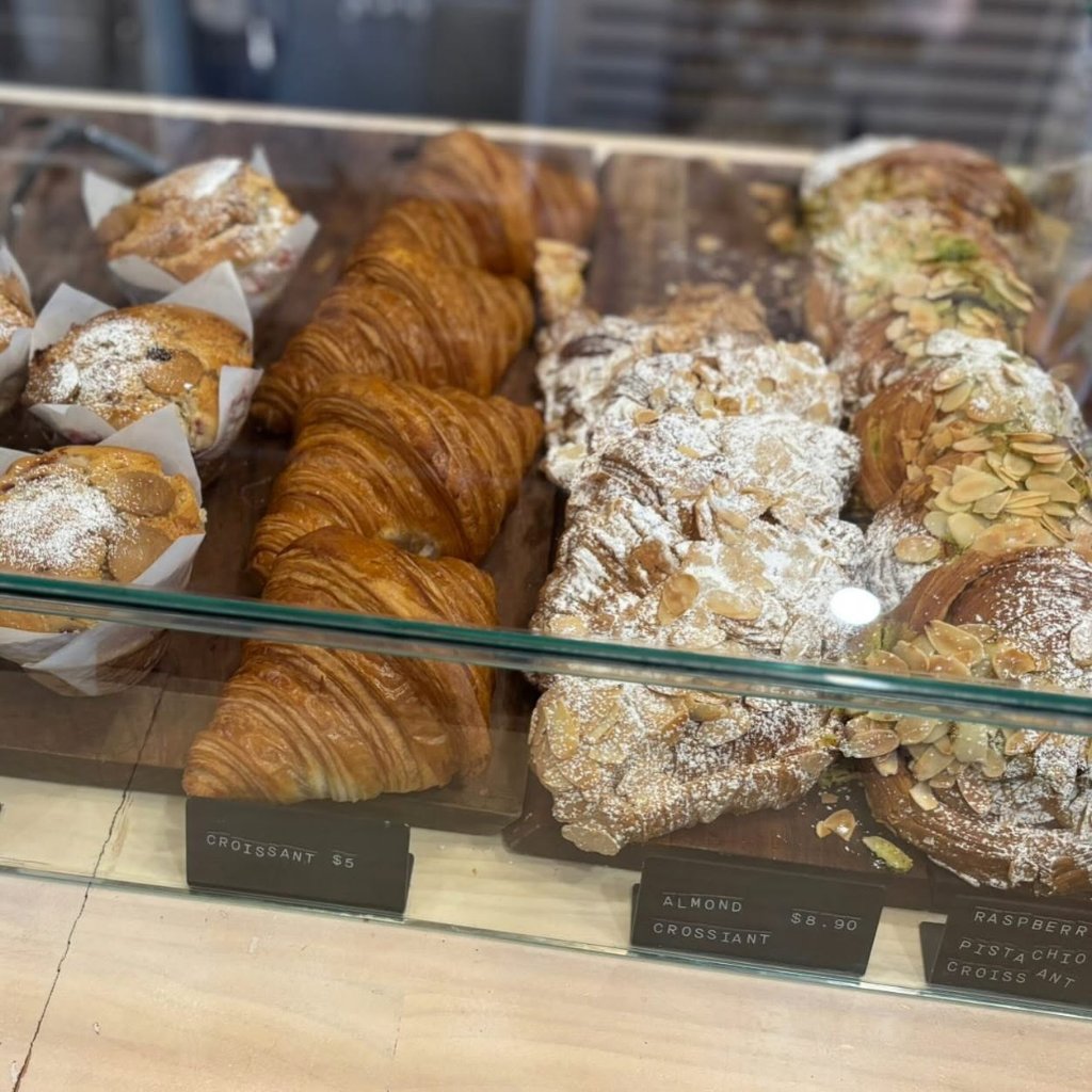 Fresh croissants and pastries at The Hideout Rosebud bakery cabinet