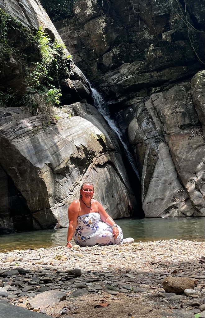 Woman at waterfall