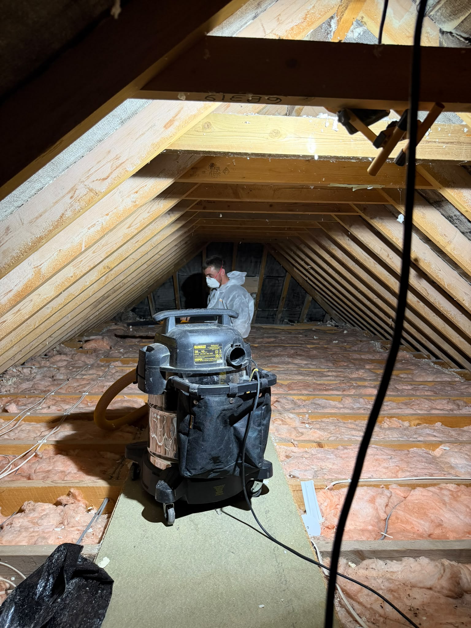 Countrywide Spray Foam Removal contractor removing spray foam insulation from UK loft