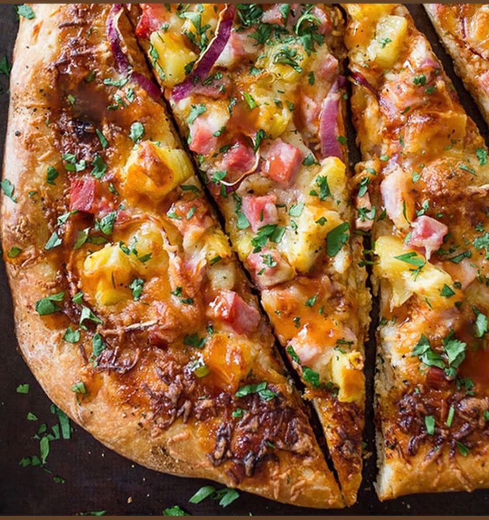 Hawaiian Pizza pizza β Pizza sauce, mozzarella, ham, and sweet pineapple chunks on a perfectly blistered wood-fired crust.