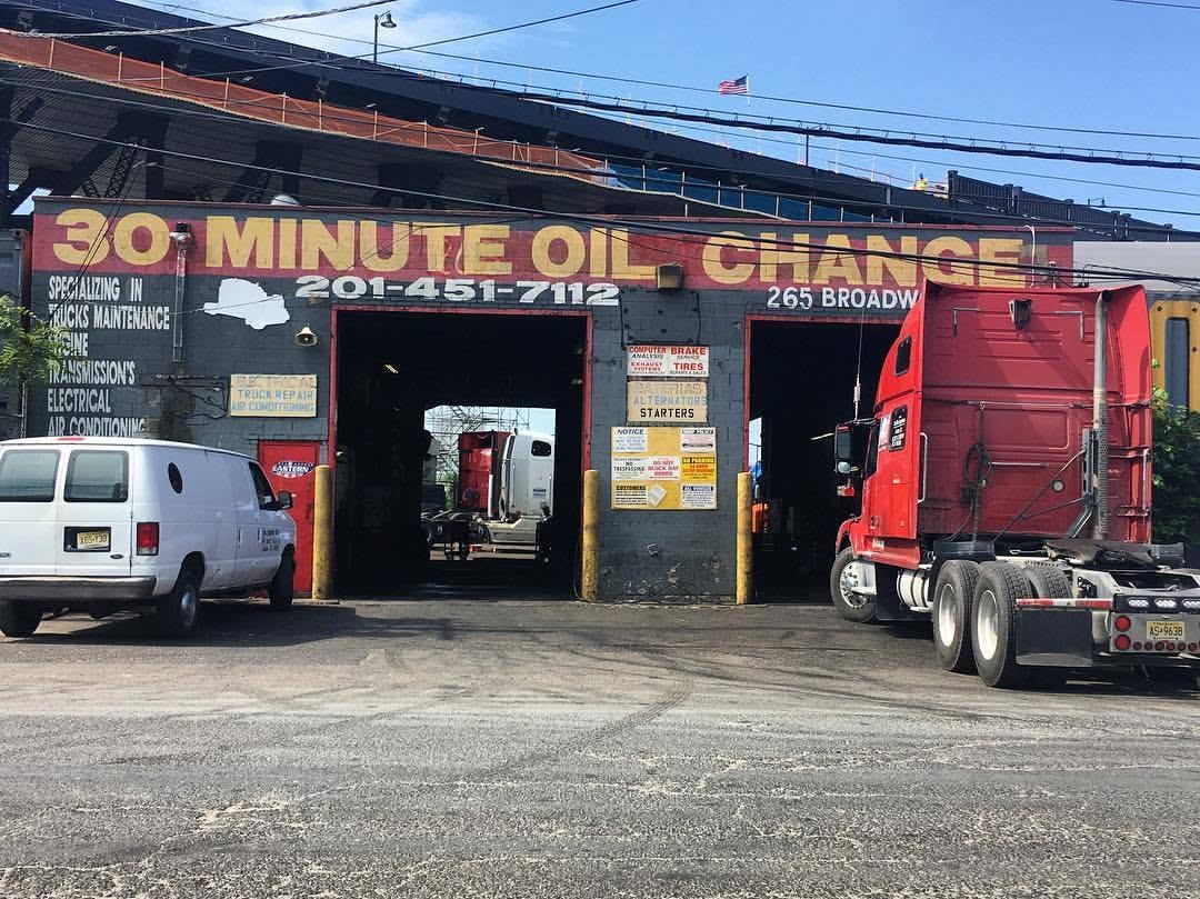 Entrance to the 30 Minute Oil Change shop with both service bays open
