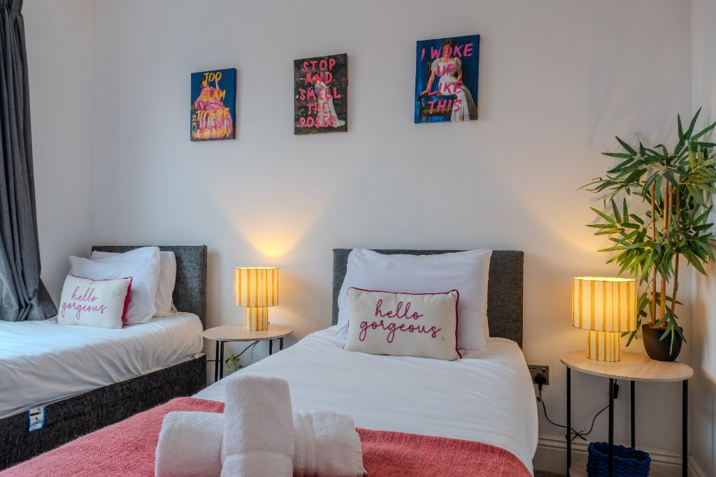 Twin bedroom prepared for guest arrival