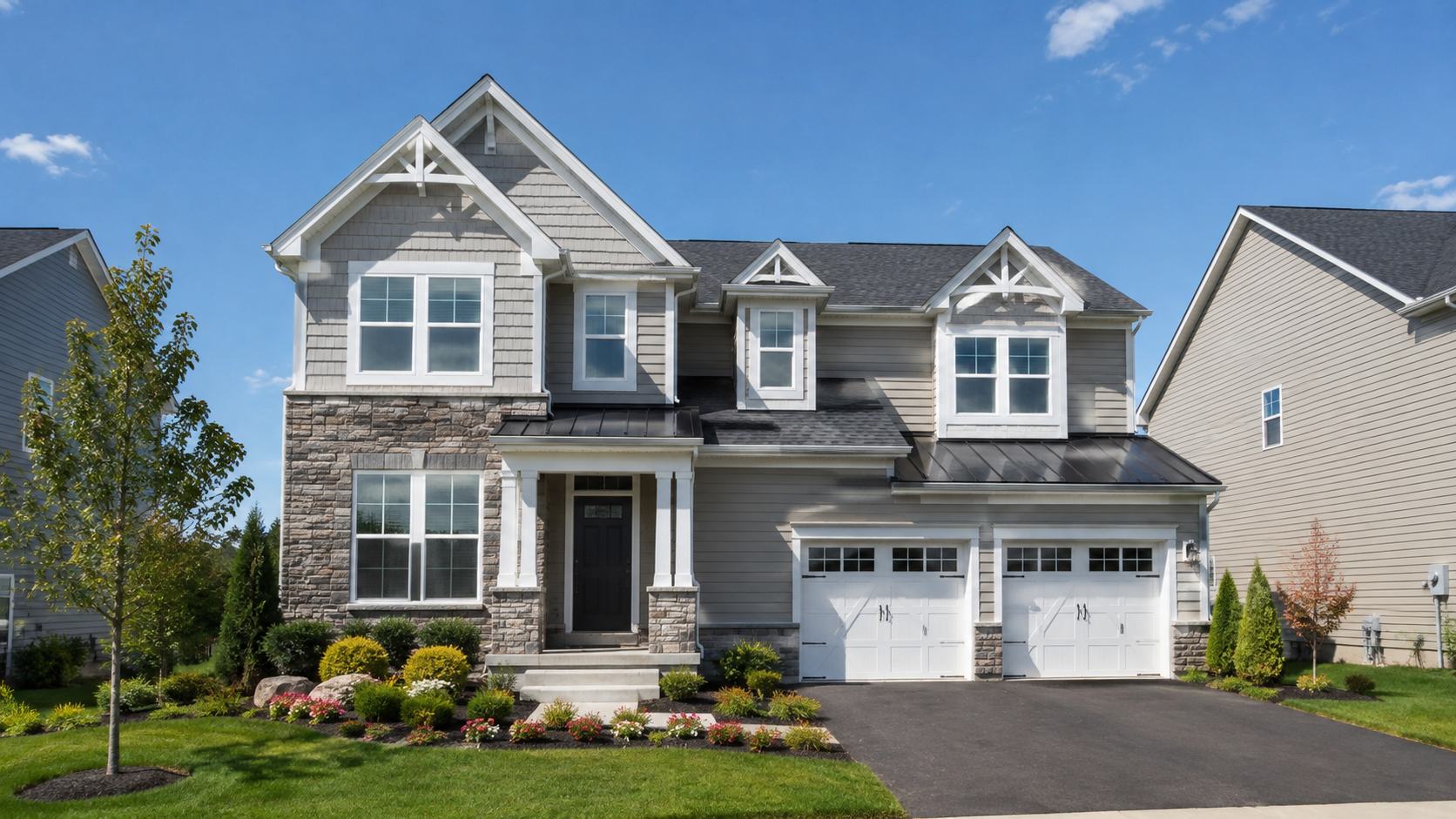 Two-story craftsman-style suburban house with light-grey siding and stone veneer — sticky-house humidity and HVAC blog post