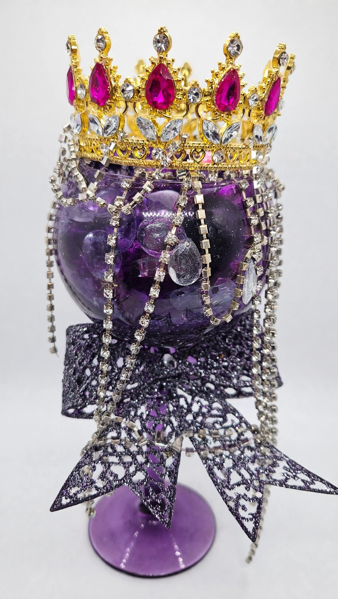 Royal amethyst crown goblet with purple glitter and a jeweled gold tiara for ritual decor