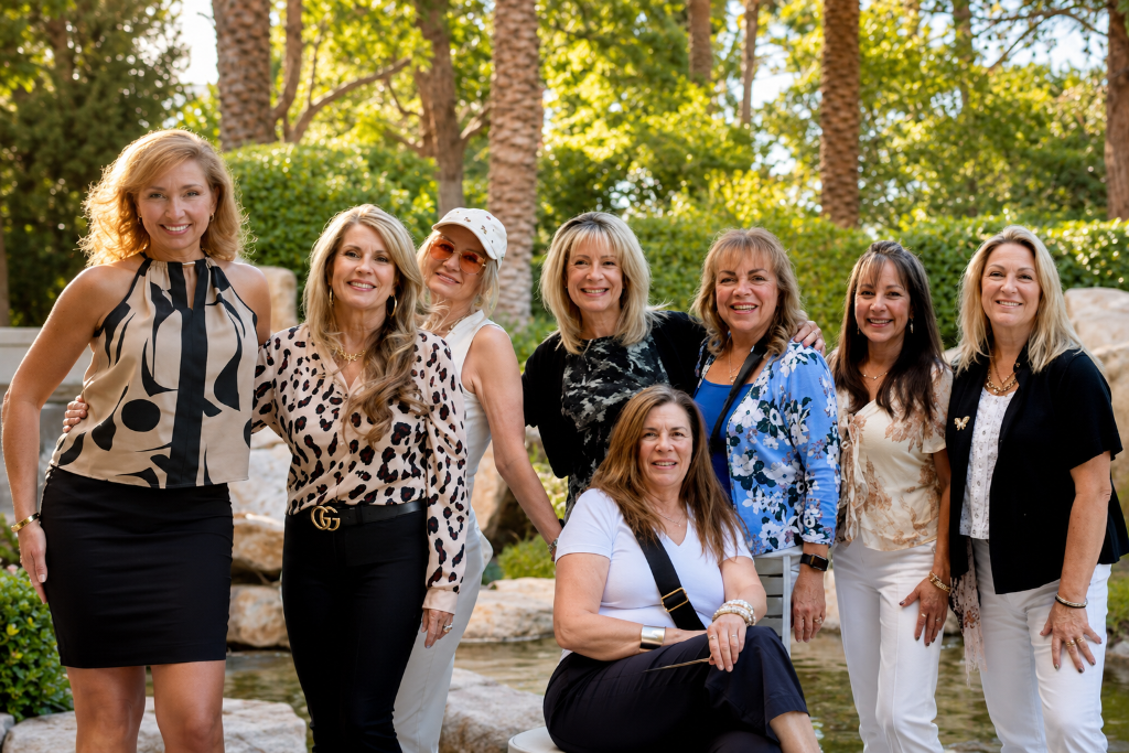 Members of The Social Pearl gathered together at an outdoor social event.
