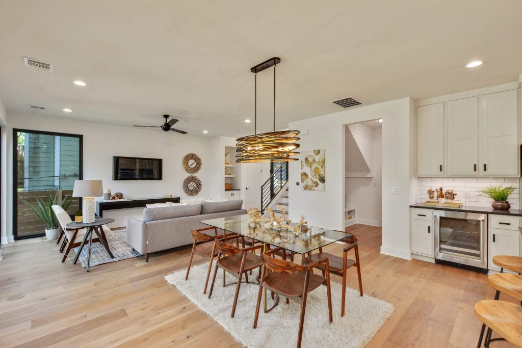 Beautifully renovated living room with smooth ceiling and fresh paint