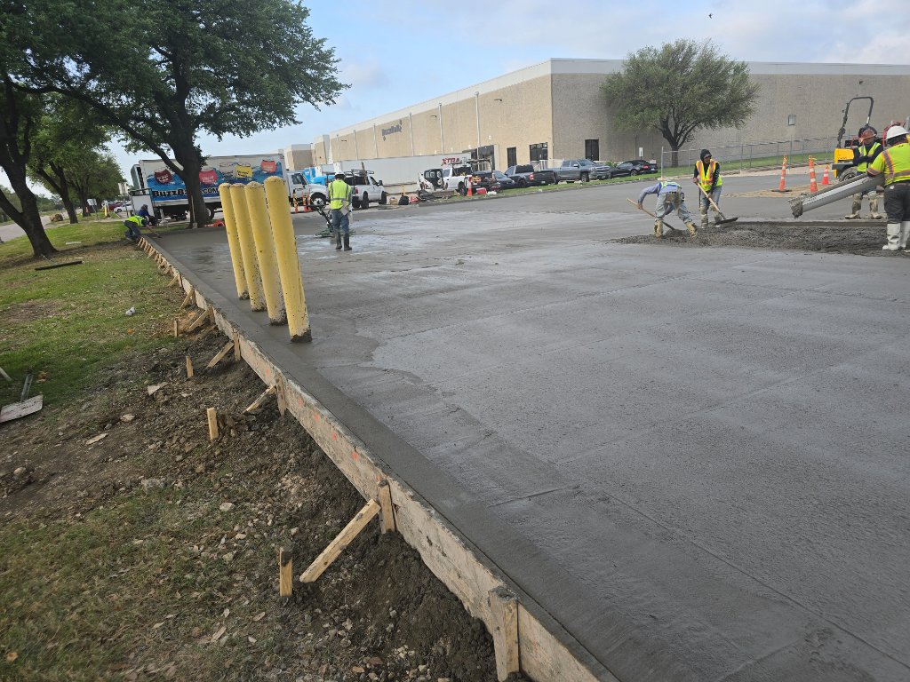 Commercial concrete pour in progress at a DFW job site