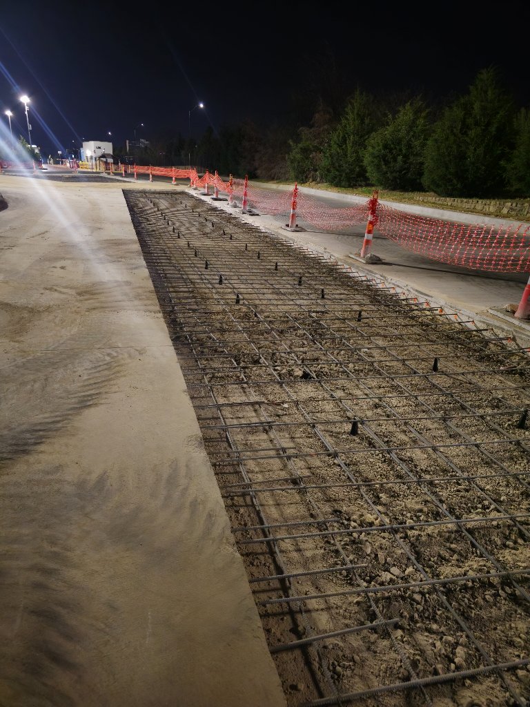 Rebar grid prepared for concrete pour at night