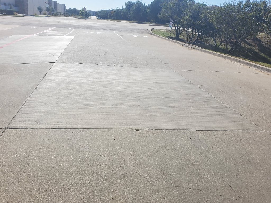 Commercial concrete patch with traffic cones