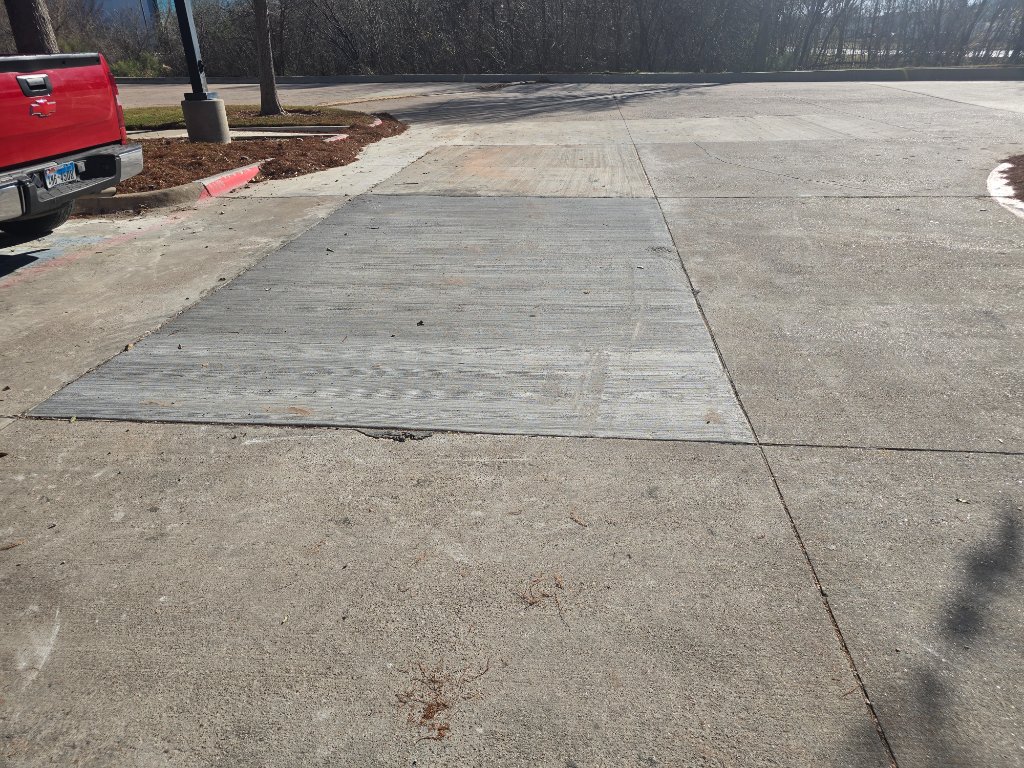 Fresh concrete poured at commercial site