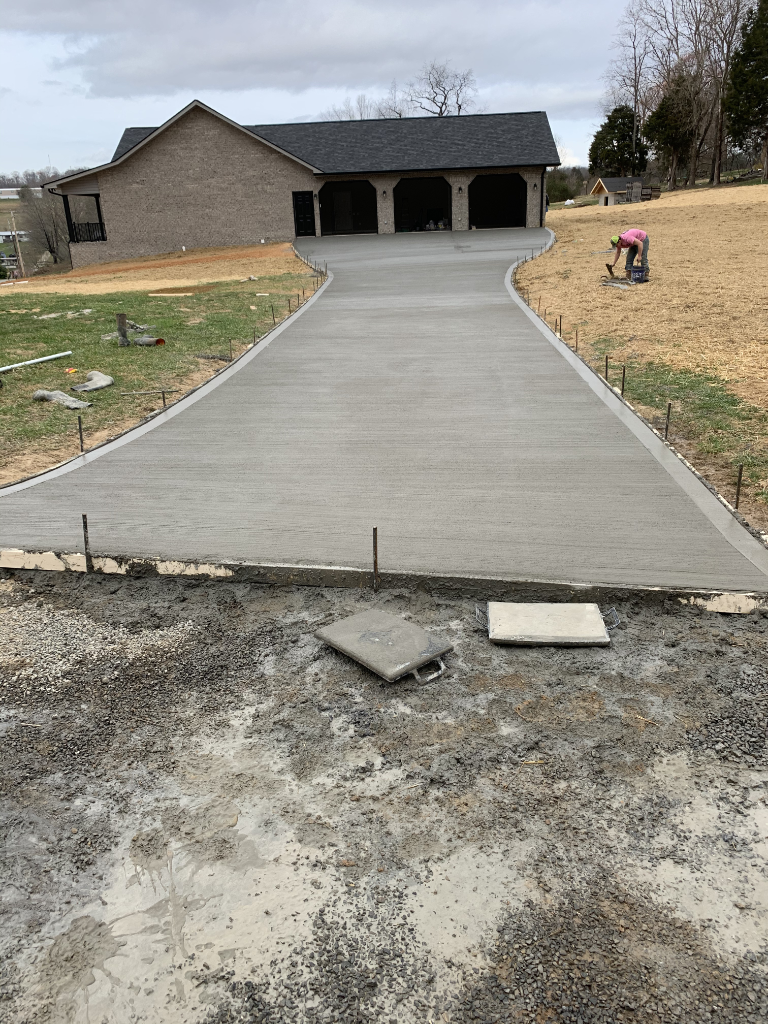 Freshly poured broom-finish concrete driveway in the Tri-Cities Tennessee area
