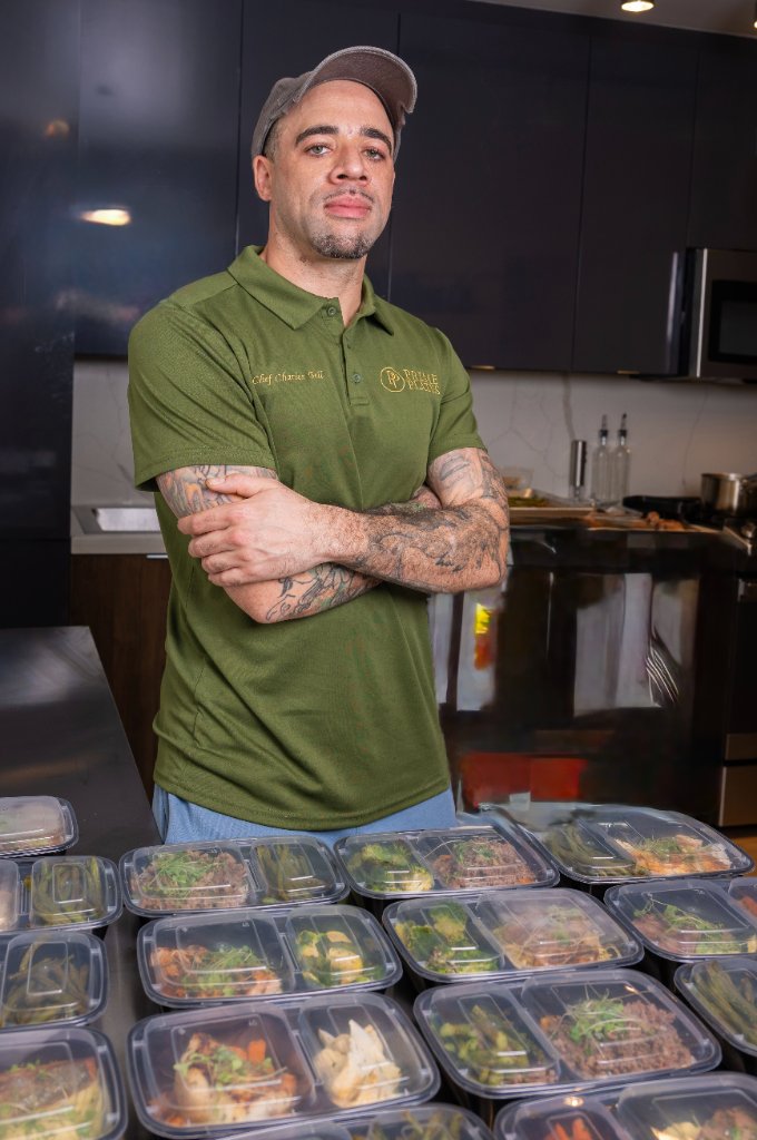 Chef Charles Bell preparing a chef-driven meal in Las Vegas
