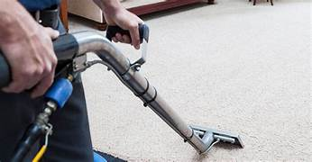 Professional steam cleaning hot water extraction equipment in action