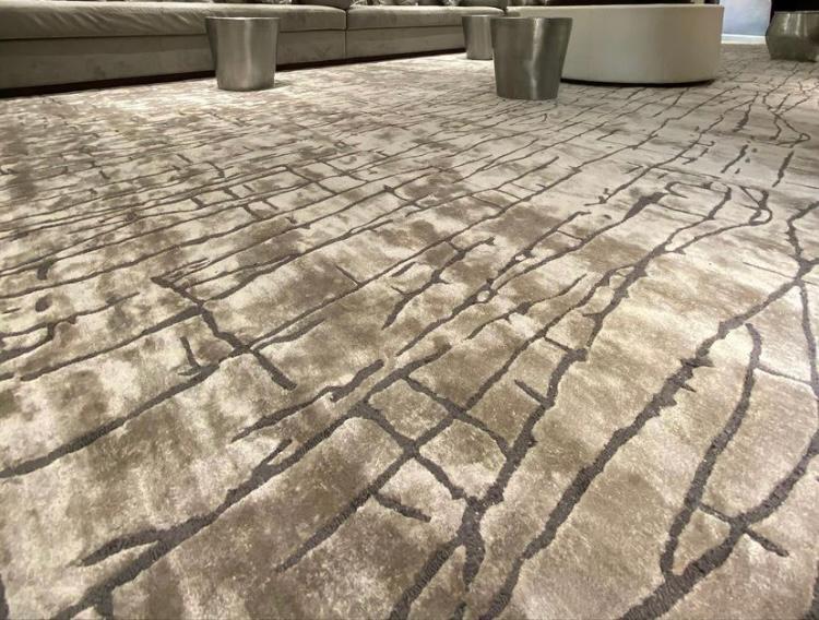 Premium hand-tufted rug with detailed pattern in luxury residential setting