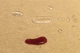 Water droplet beading on protected carpet fiber with fiber guard treatment