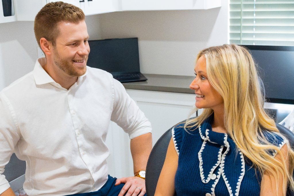 Doctor and patient sharing a smile during a consultation