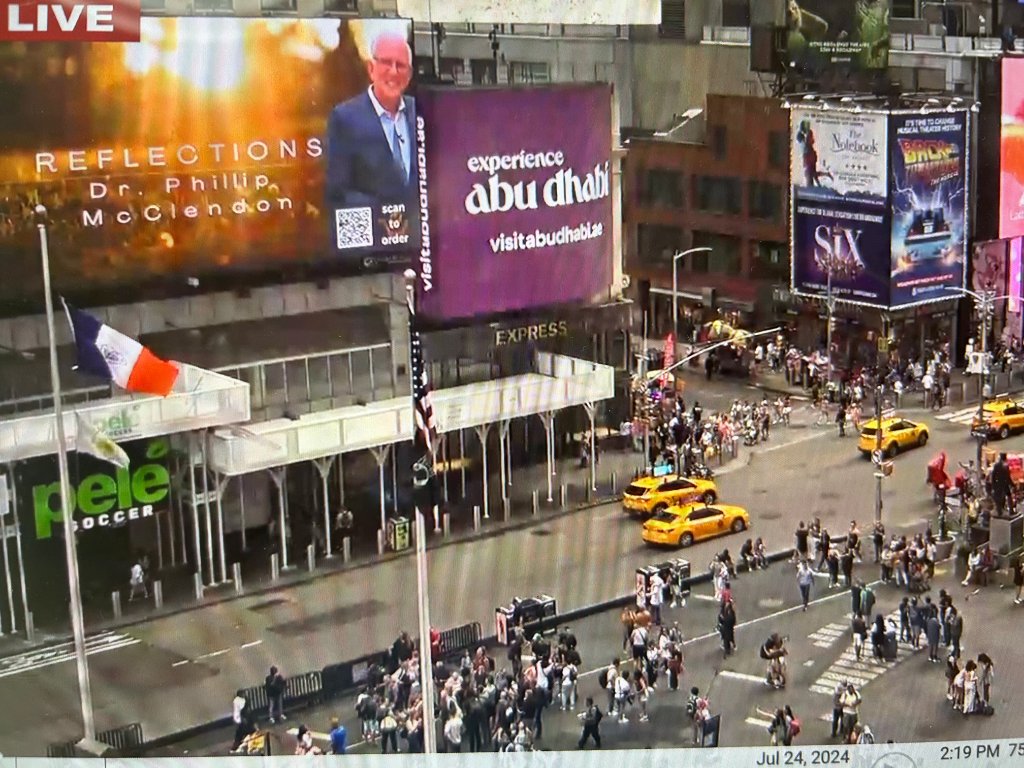 Reflections on Times Square billboard