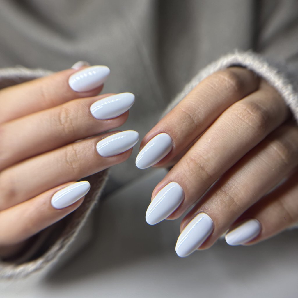 Structured gel manicure with a milky white finish